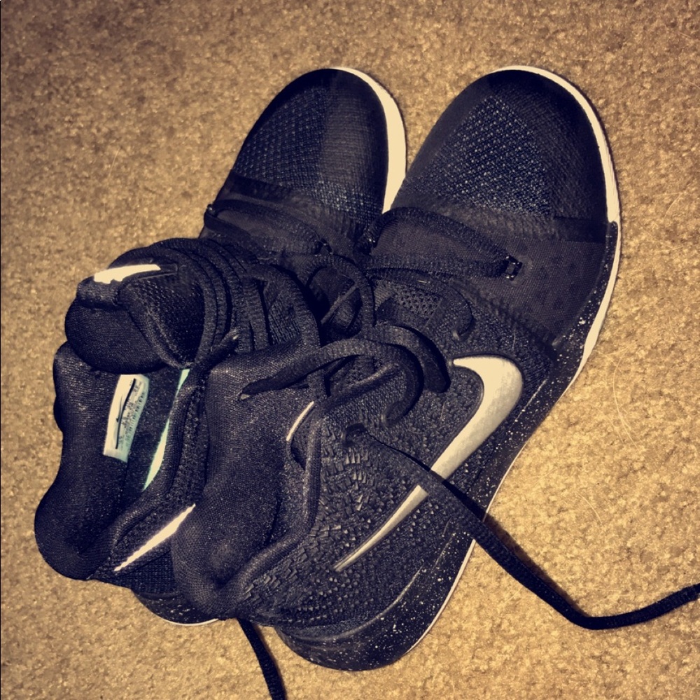 black NIKE kyries